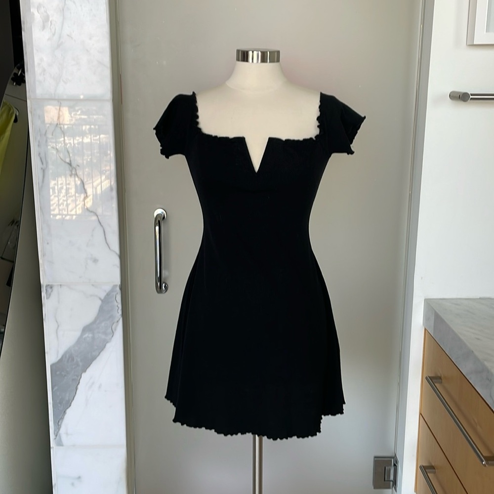 Majorelle blk knit dress compliments your figure! Size large